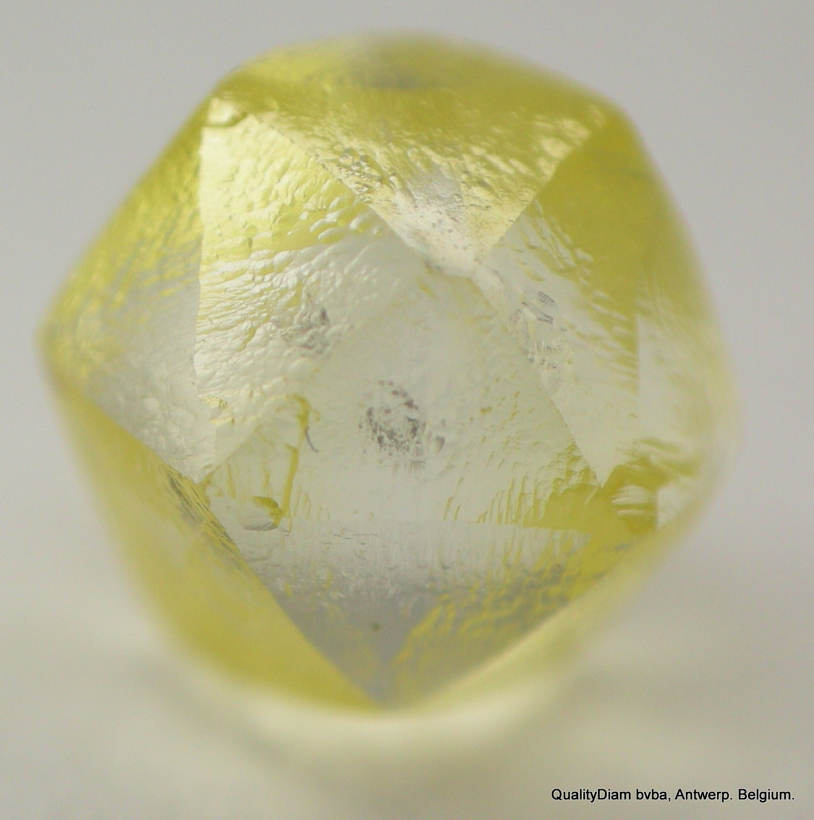 0.58 Carat Unusual Intense Fancy Yellow Raw Diamond in a Rare Tetra Shape